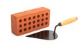 Red perforated ceramic brick and trowel isolated