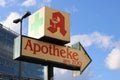 Red Pharmacy Sign - Apotheke in Berlin, Germany Royalty Free Stock Photo