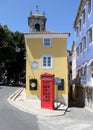 Red phone booth and colorful residential and commercial buildings in the historic heart of Sintra, Portugal Royalty Free Stock Photo