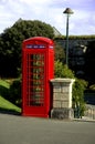 Red phone box with new technology Royalty Free Stock Photo