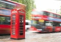 Red Phone cabine and bus in London. Royalty Free Stock Photo