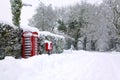 Red phonebox in the snow Royalty Free Stock Photo