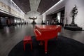 A red piano inside the showroom Royalty Free Stock Photo