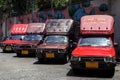 Red pickup trucks for tourist in Thailand