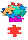 Red piece near pile of jigsaw puzzles Royalty Free Stock Photo