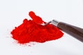 Red pigment on a white background