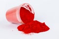 Red pigment on a white background