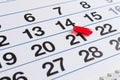 Red pill on the calendar. Schedule medication Royalty Free Stock Photo