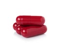 Red pill capsules on white background Royalty Free Stock Photo