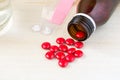 Red pill, patient, with medicine and water Royalty Free Stock Photo