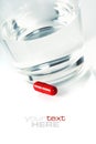 Red pill and water Royalty Free Stock Photo