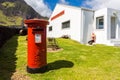 Red pillar postbox, free-standing post box, Post Office and Tourism Centre, Edinburgh of the Seven Seas, Tristan da Cunha island. Royalty Free Stock Photo