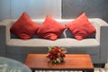 Red pillow on sofa decoration in living room interior Royalty Free Stock Photo