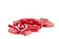 Red Pills (Capsules) in white background Royalty Free Stock Photo