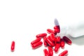 Red pills and pill bottle Royalty Free Stock Photo