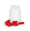 Red pills and pill bottle on a white background Royalty Free Stock Photo