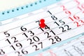 Red pin on calendar with marked date of Valentines Day Royalty Free Stock Photo