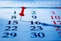 Red pin marking the 15th on a calendar Royalty Free Stock Photo