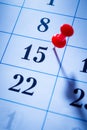 Red pin marking the 15th on a calendar Royalty Free Stock Photo