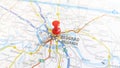 A red pin stuck in Belgrade on a map of Serbia Royalty Free Stock Photo