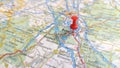 A red pin stuck in Bonn on a map of Germany Royalty Free Stock Photo