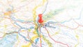 A red pin stuck in Bratislava on a map of Slovakia