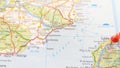 A red pin stuck in Calais on a map of England and France Royalty Free Stock Photo