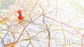 A red pin stuck into the city of Nottingham on a map of England Royalty Free Stock Photo