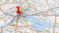 A red pin stuck in the city of Orebro on a map of Sweden Royalty Free Stock Photo