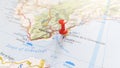 A red pin stuck in Gibraltar on a map of Spain Royalty Free Stock Photo