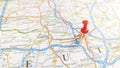 A red pin stuck in Halle on a map of Germany Royalty Free Stock Photo