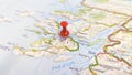 A red pin stuck in the isle of Mull on a map of Scotland Royalty Free Stock Photo