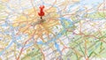 A red pin stuck in London city on a map of England Royalty Free Stock Photo