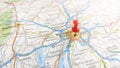 A red pin stuck in Munich on a map of Germany Royalty Free Stock Photo