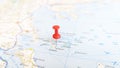 A red pin stuck in the Vories sporades islands on a map of Greece Royalty Free Stock Photo