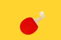 Red ping pong paddle and a white ball Royalty Free Stock Photo