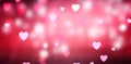 Red and pink festive background with soft heart shaped bokeh. St. Valentines backdrop.