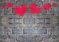 Red and pink heart paint on stone brick wall Royalty Free Stock Photo