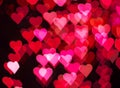 Red and pink hearts bokeh as background for Valentine's day Royalty Free Stock Photo