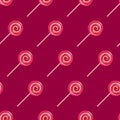 Red and pink lollipop spiral candies seamless