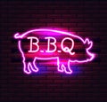 Red and Pink Neon BBQ Pig sign on a brick background . BBQ of Neon-Style. Royalty Free Stock Photo