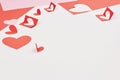 Red and pink paper hearts on white background. Valentine`s day, love, wedding concept Royalty Free Stock Photo