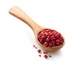 Red, pink peppercorns in a wooden spoon Royalty Free Stock Photo