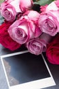 Red and pink roses on table Royalty Free Stock Photo