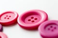 Red and pink sewing buttons on white background Royalty Free Stock Photo
