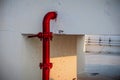 Red pipe of Fire Fighting systems is supplying water to the water sprinkler or private fire hydrants Royalty Free Stock Photo