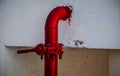 Red pipe of Fire Fighting systems is supplying water to the water sprinkler or private fire hydrants Royalty Free Stock Photo