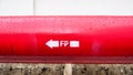 Red pipe with white arrow Royalty Free Stock Photo