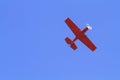 Red plane on blue sky Royalty Free Stock Photo