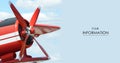 Red plane with propeller flying in blue skies Royalty Free Stock Photo